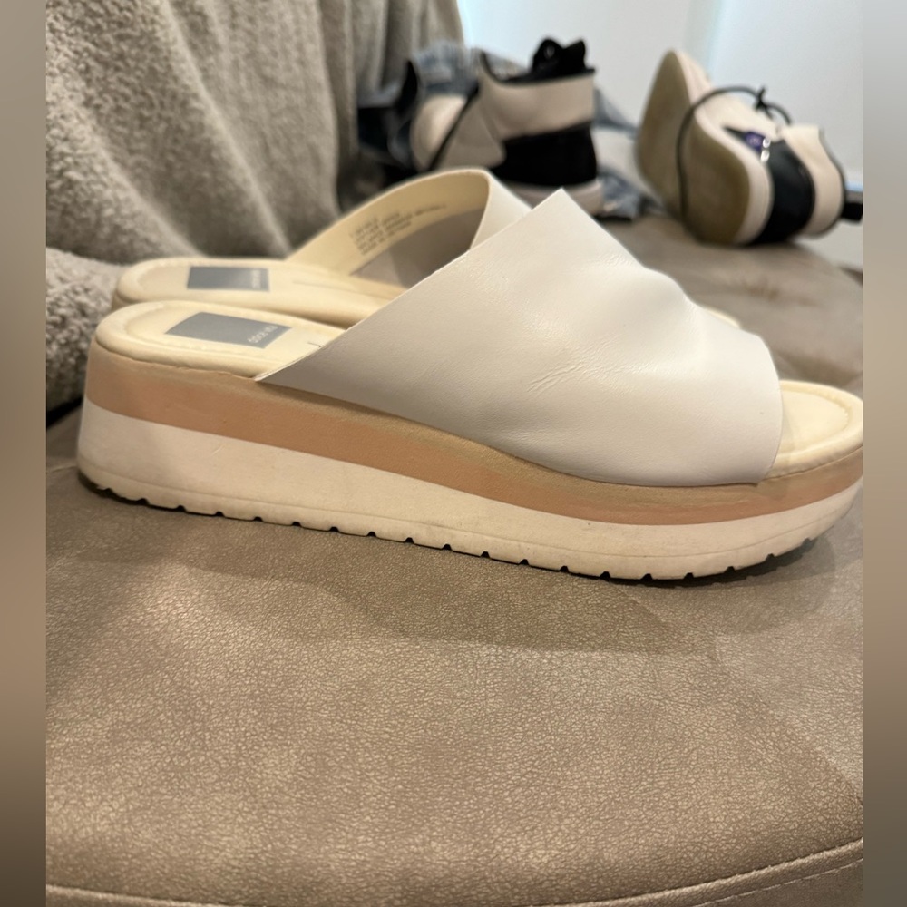 White Dulce Vita slip ons